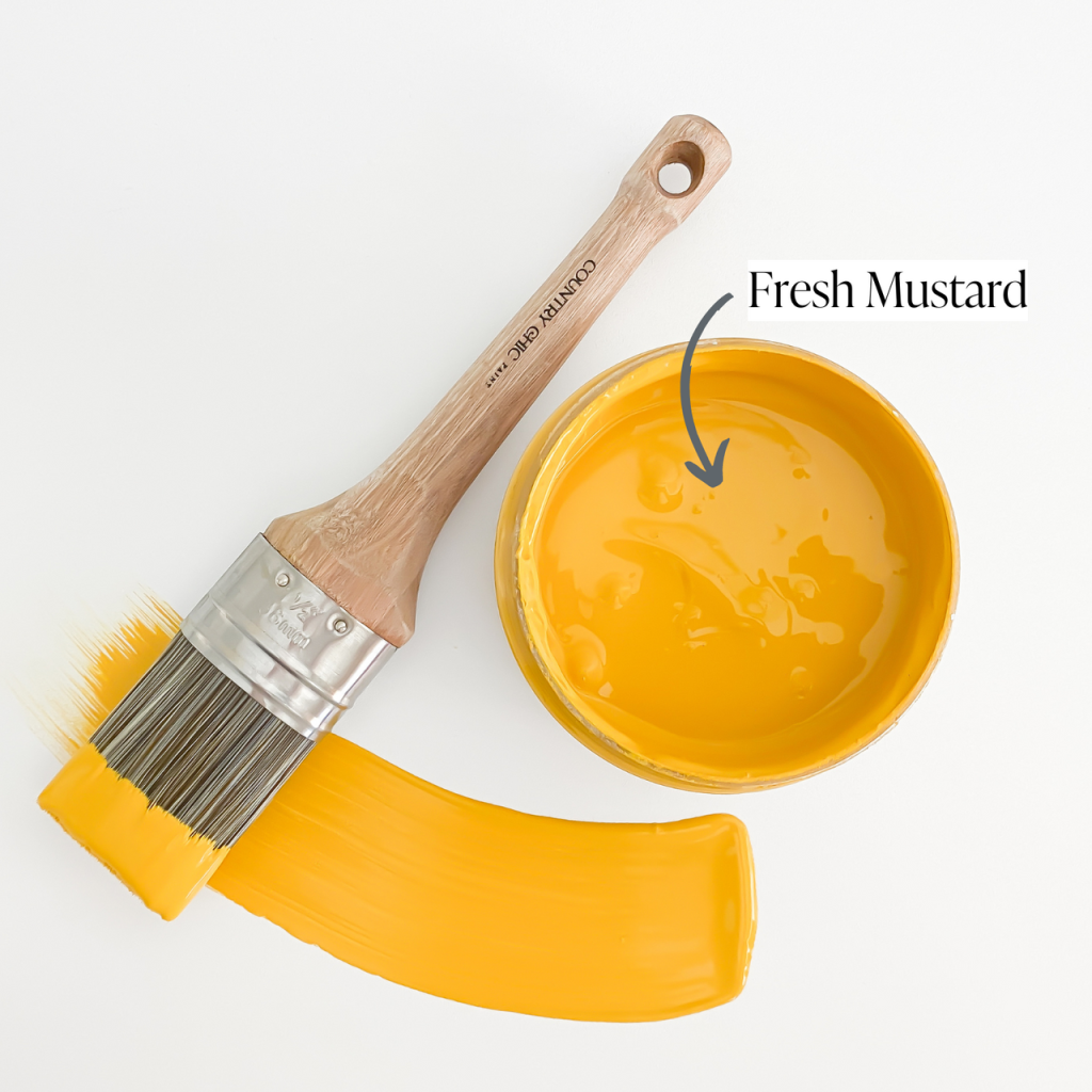 Top view of an open 16oz jar of Country Chic Chalk Style All-In-One Paint in the color Fresh Mustard. Mustard yellow.