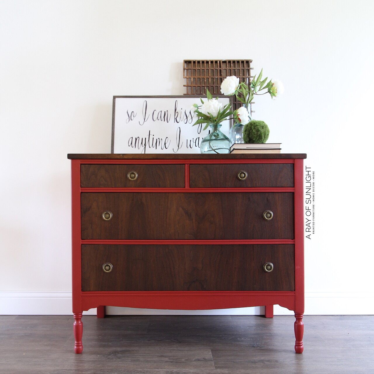 A wooden dresser painted in the Country Chic Paint crimson red color Paint the Town.