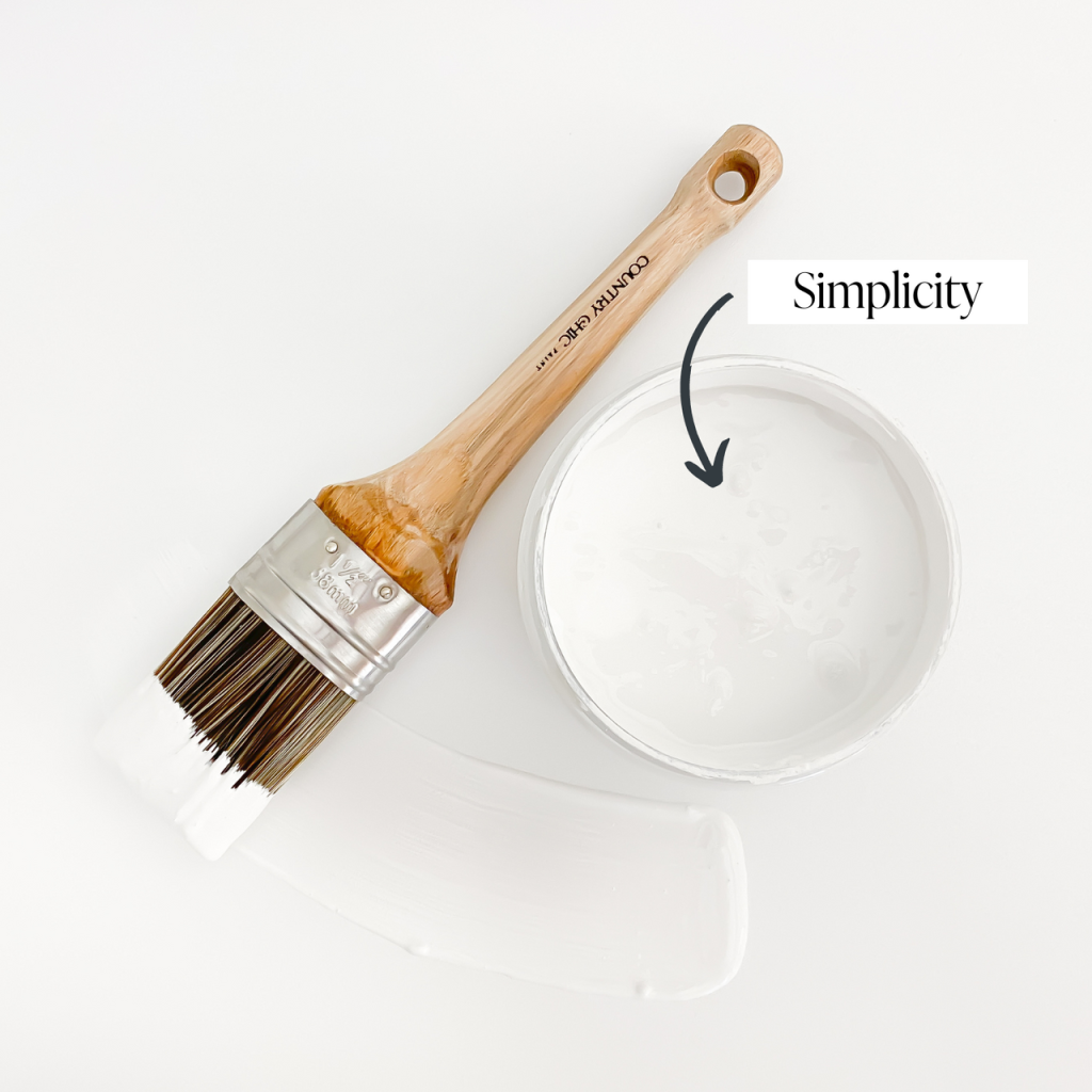 Top view of an open 16oz jar of Country Chic Chalk Style All-In-One Paint in the color Simplicity. Pure white.