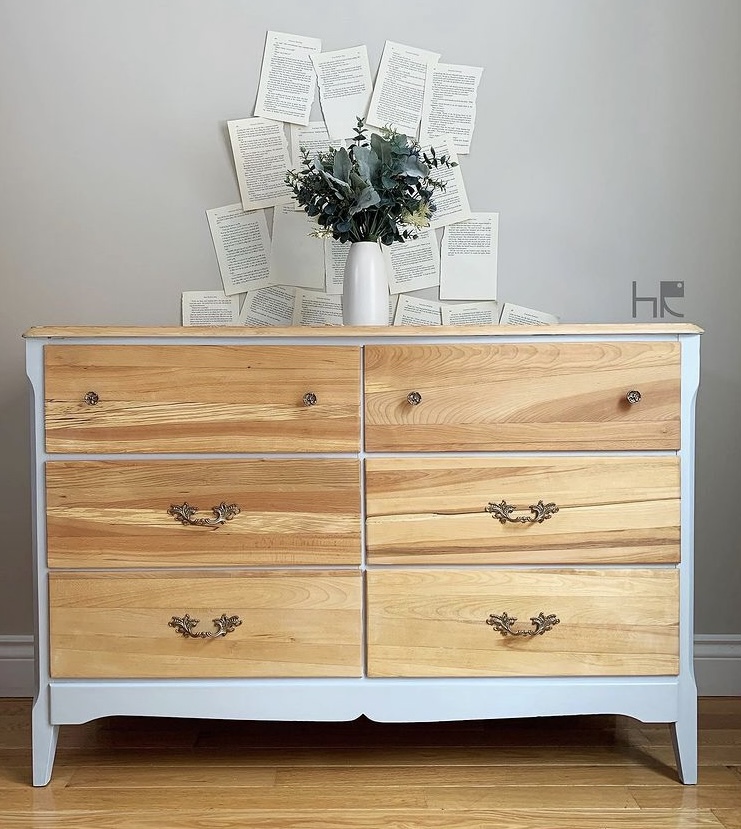 Pastel blue painted dresser with raw light natural wood drawers