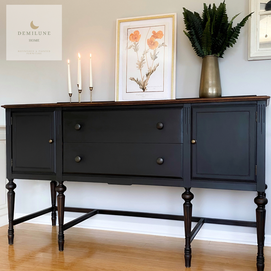 Black painted buffet server with dark stained wood legs