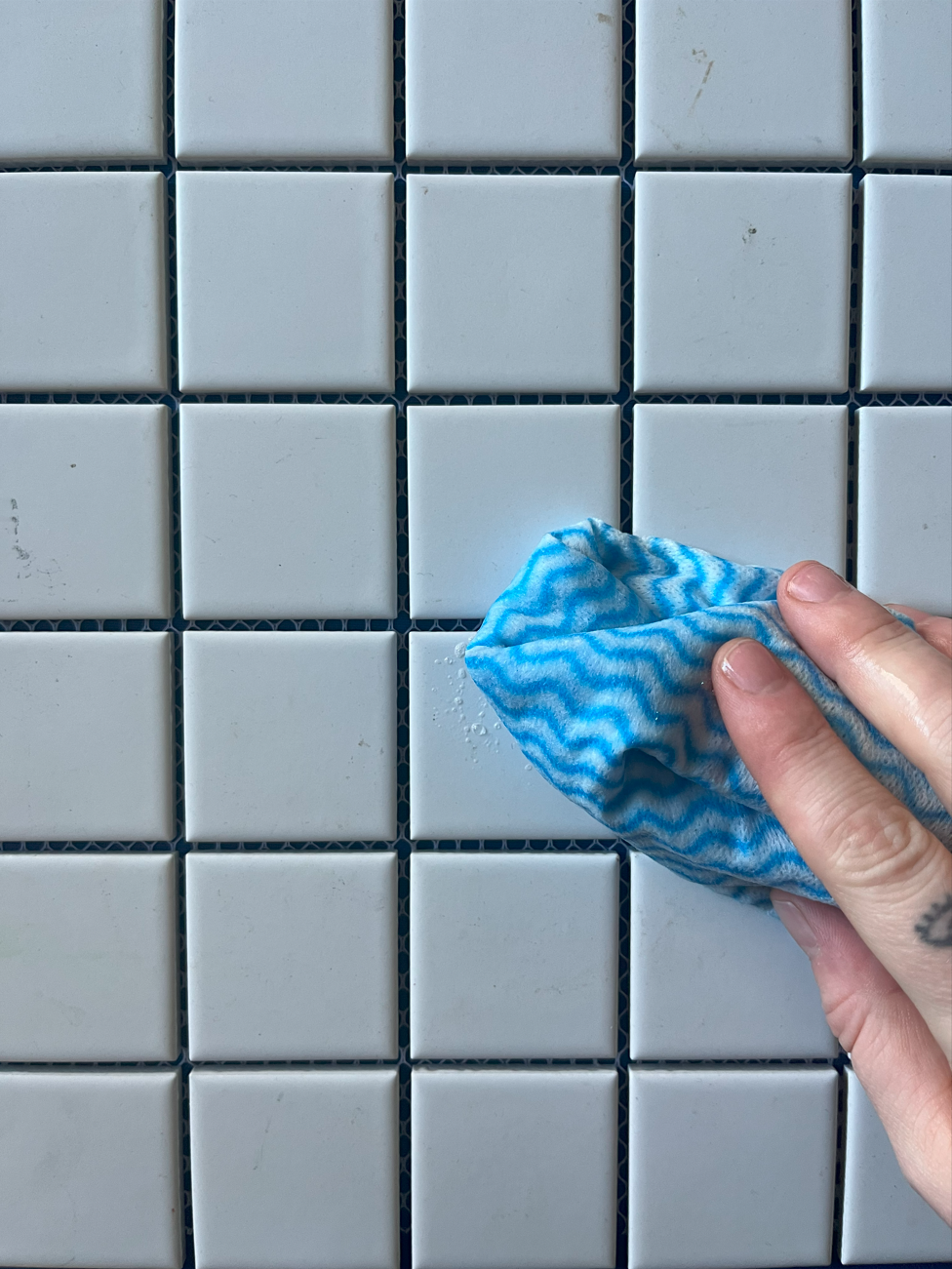 Tile painting cleaning with a jay cloth