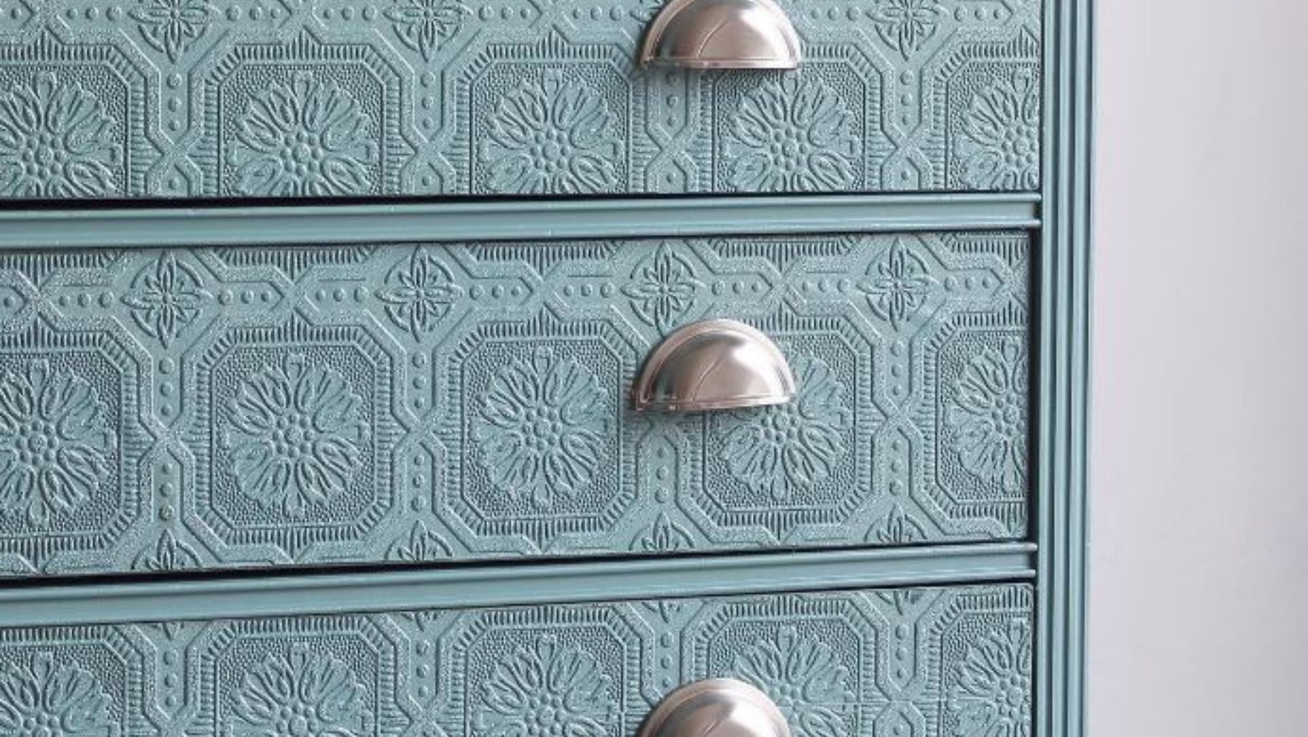 bliss teal painted textured wallpaper dresser with silver cup pulls