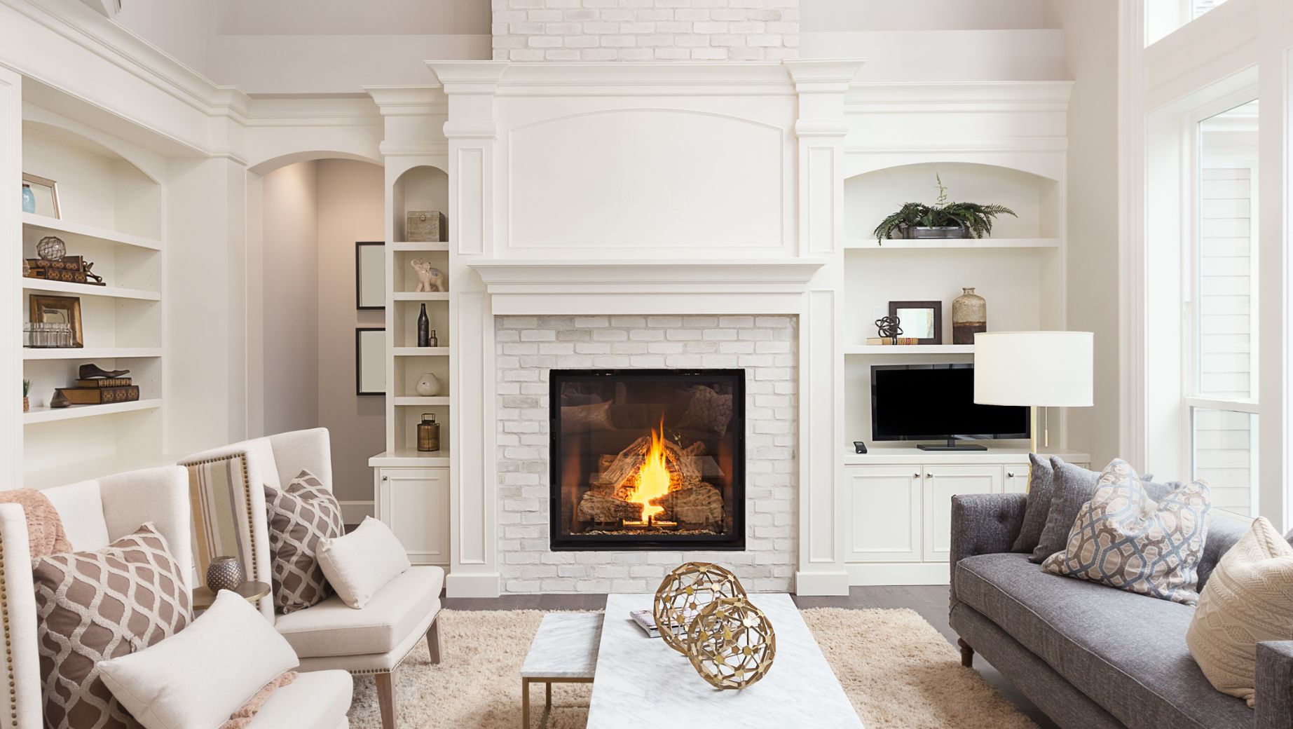 white livingroom with fireplace